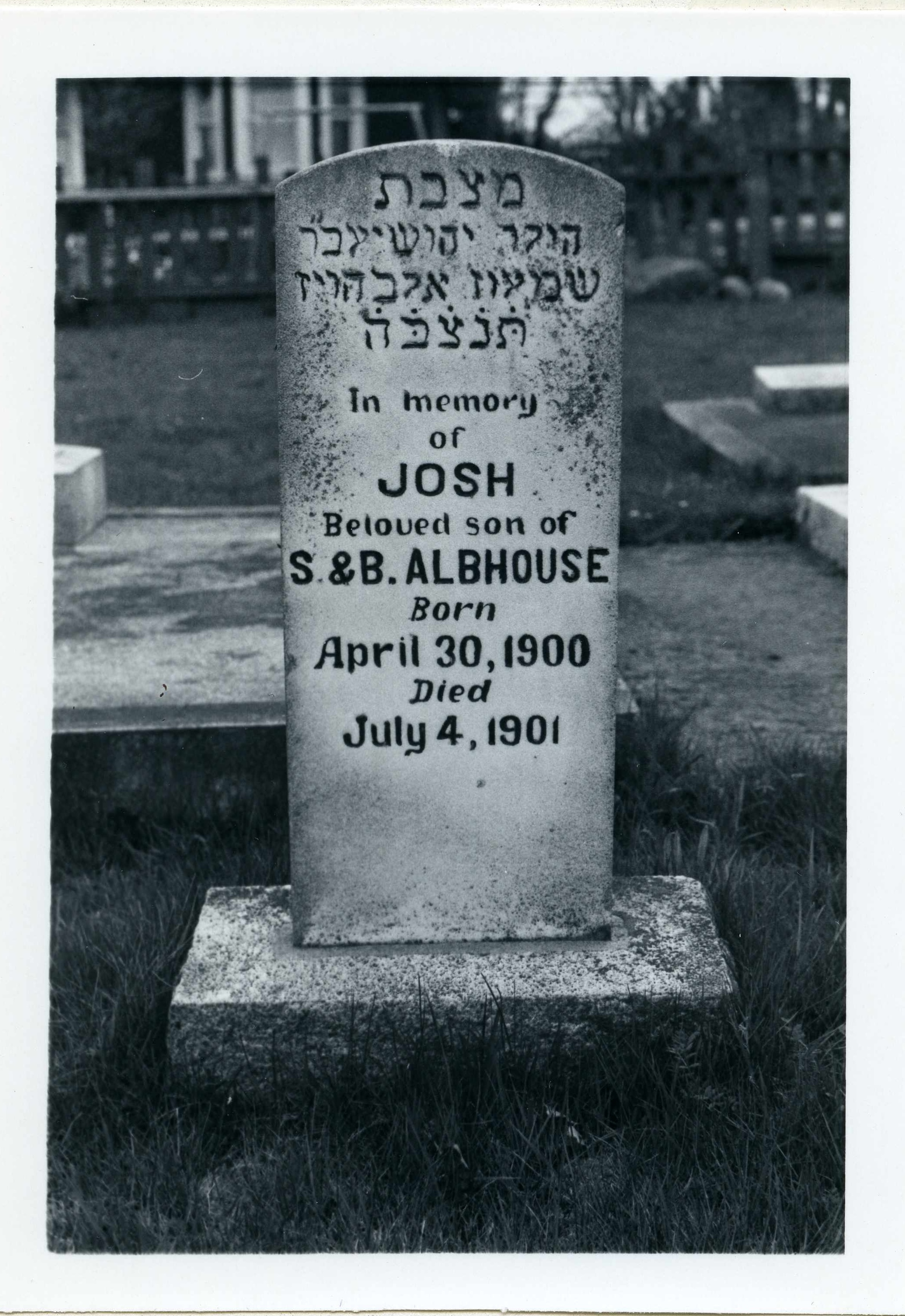 black & white photo of grave marker