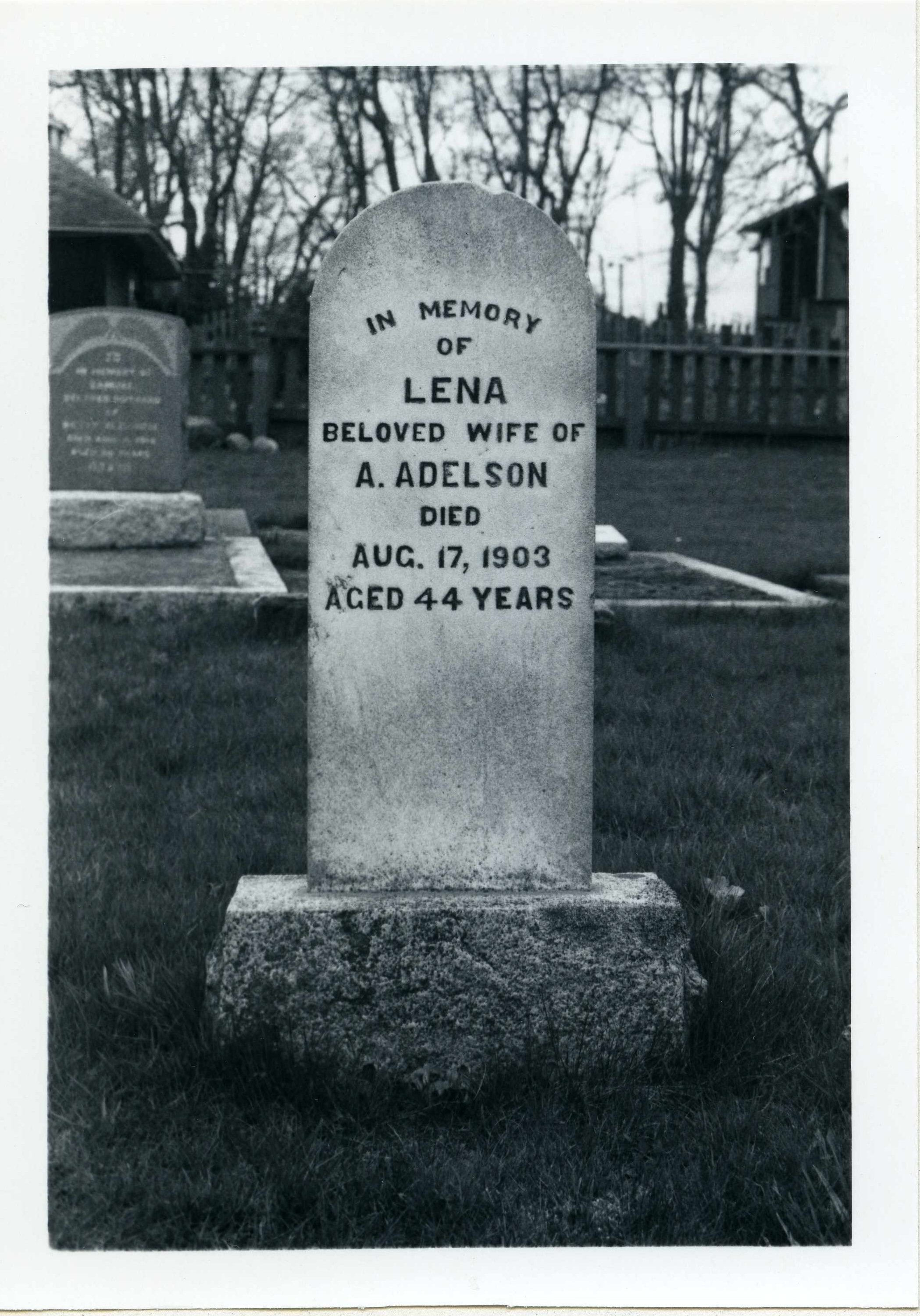 Black & white photo of the grave marker of Lean Adelson c.1984
